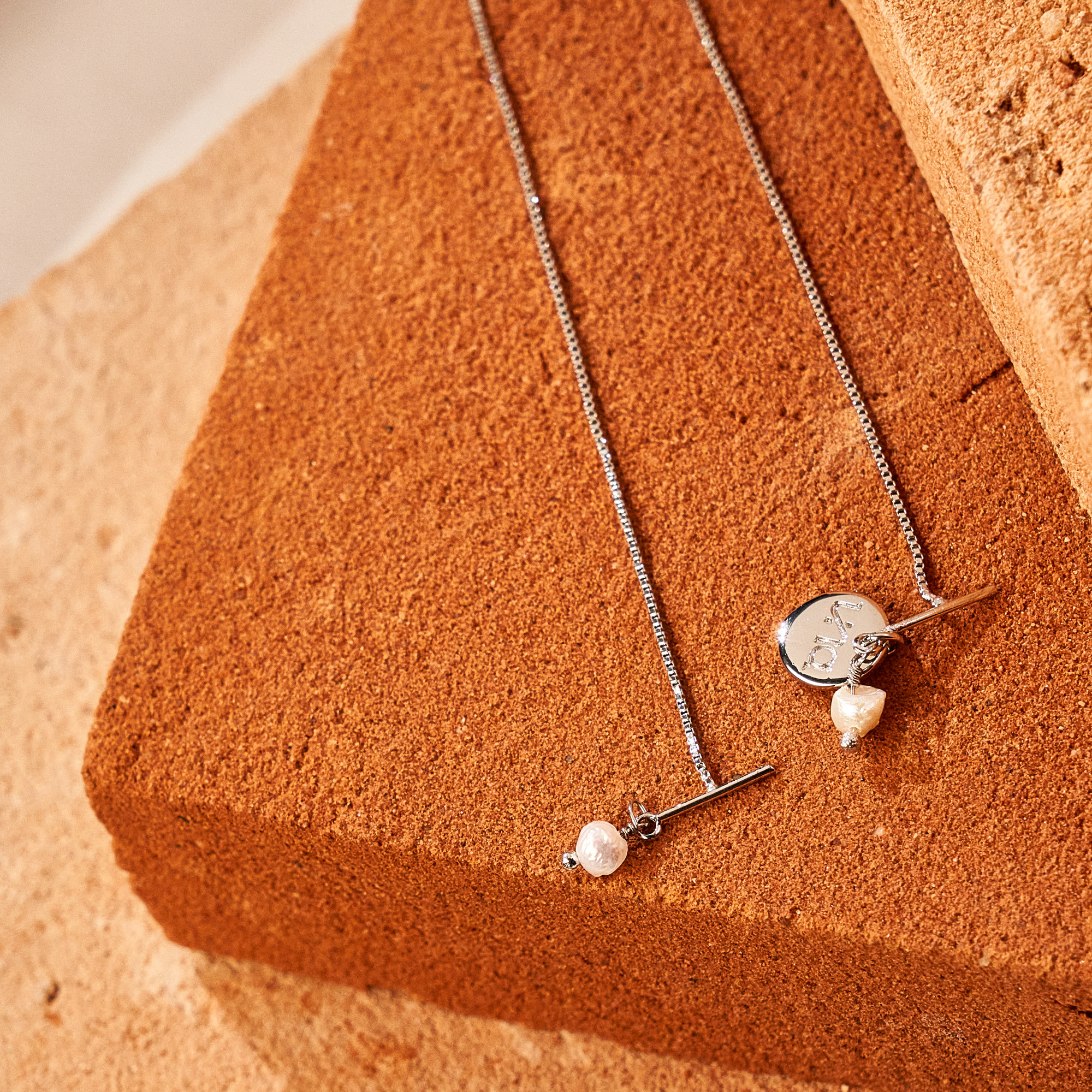 Brinco Jessy Banho Ródio Branco