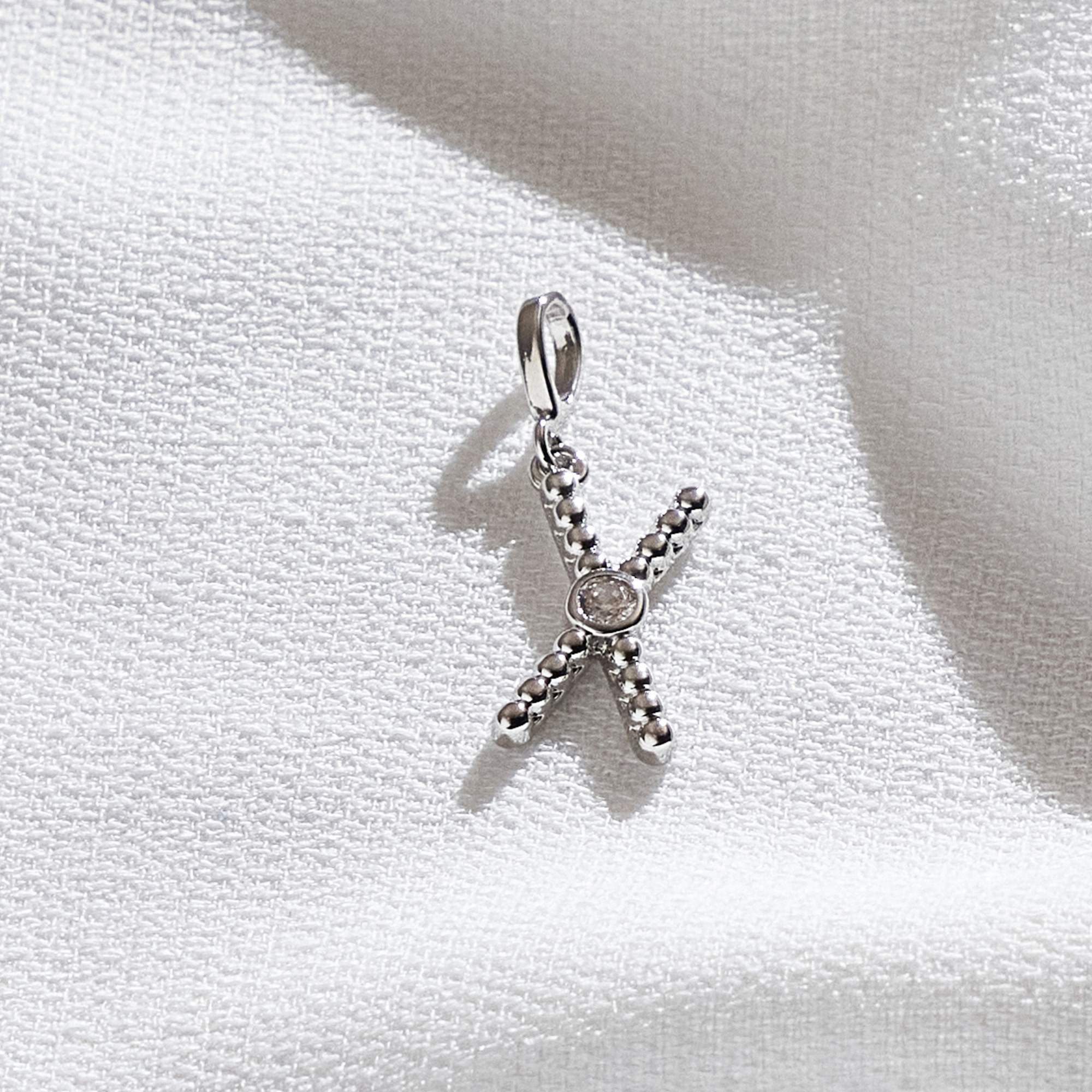 Pingente Dasha X Banho Ródio Branco