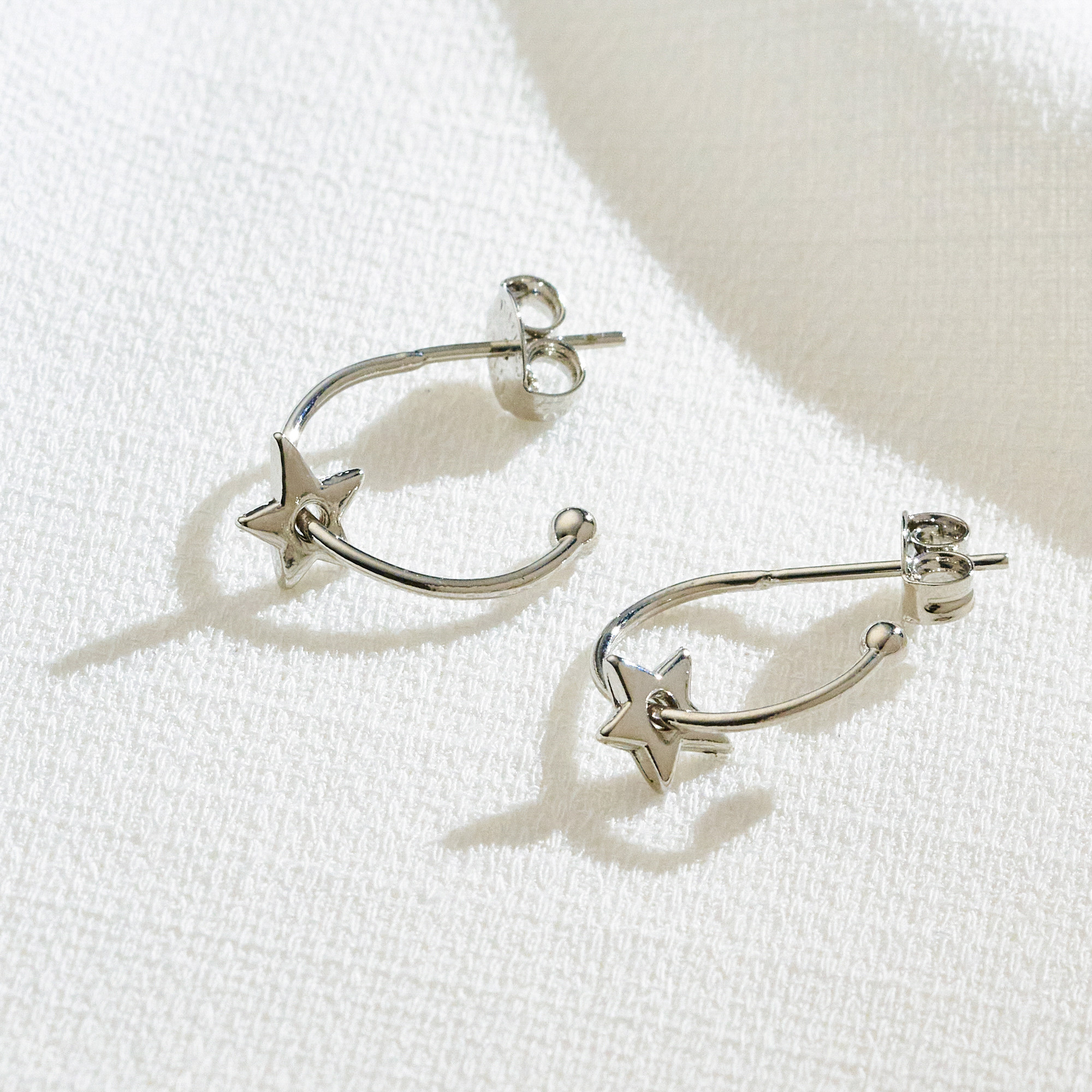 Brinco Electra Banho Ródio Branco