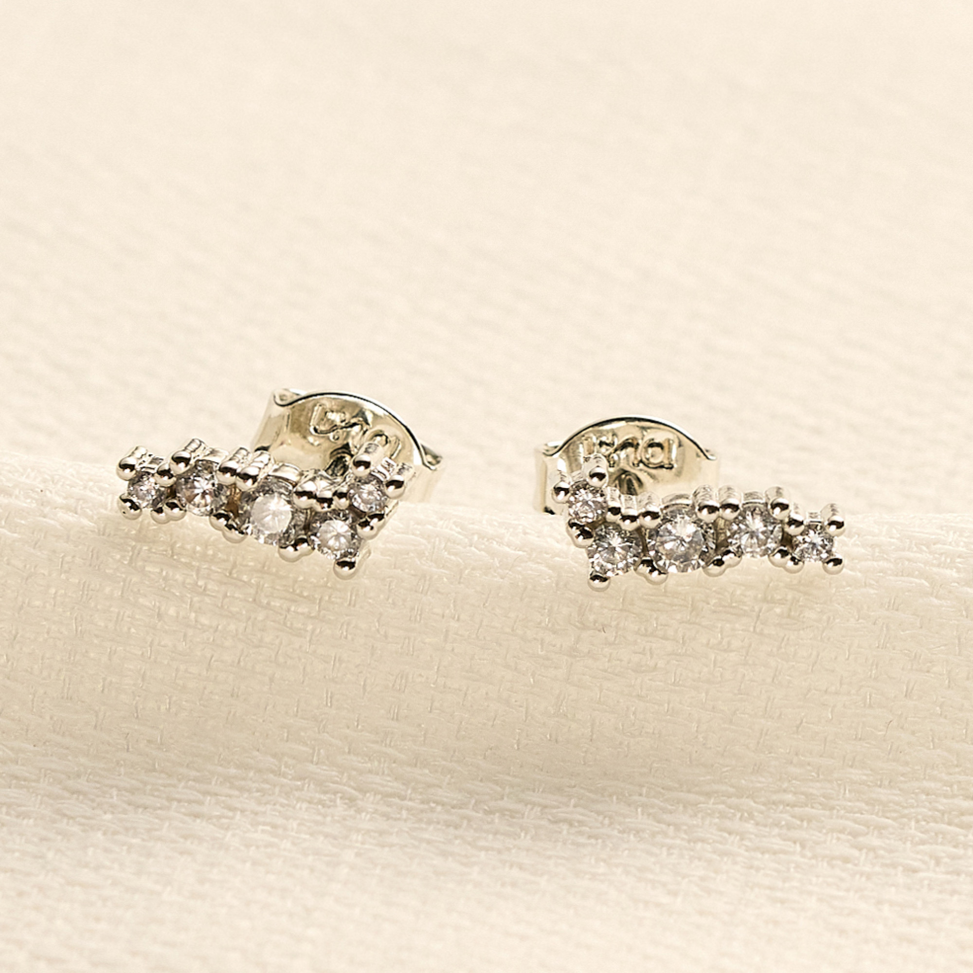 Brinco Mira Banho Ródio Branco