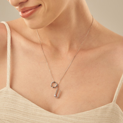 Pingente Dasha U Banho Ródio Branco